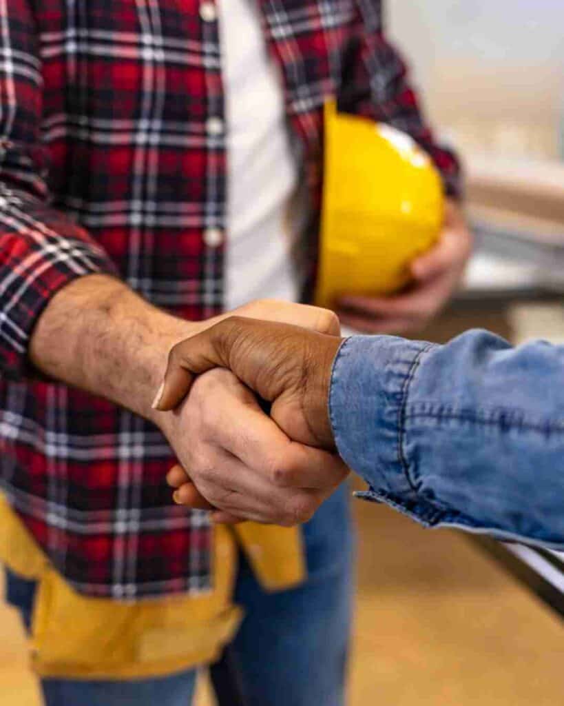 NJ General Contractor shakes hands